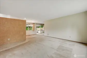 Living Room looking through to the patio and Rec room.