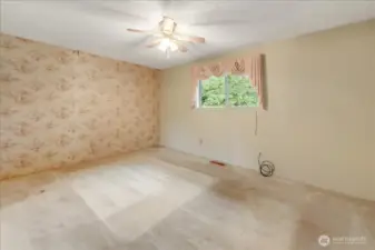 Primary Bedroom with suggestion as to where you might set up the bed?