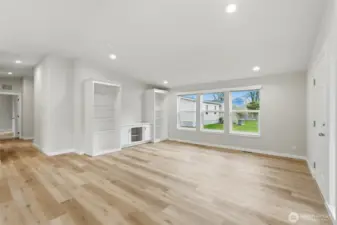 Durable flooring with light-brown tones adds warmth and makes cleaning a breeze in high traffic areas.