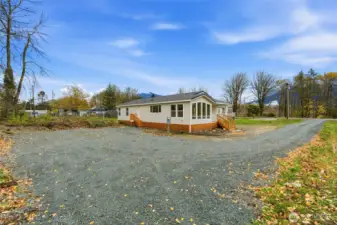 Plenty of graveled parking space for additional vehicles or toys!