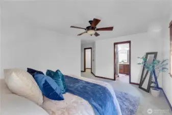 Primary bedroom with lots of natural light, walk-in closet and ensuite bath