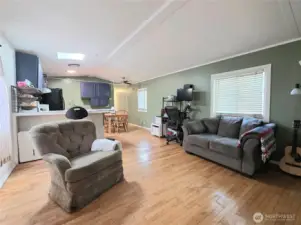 Spacious living room with easy flow to the dining area and kitchen.