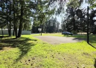 Shadow Pines has game—literally. Full sport court for hoops, play, and weekend fun.