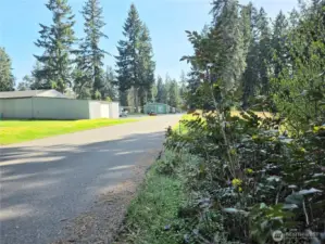 A warm welcome every time you come home. Long driveway, quiet setting, Shadow Pines living.