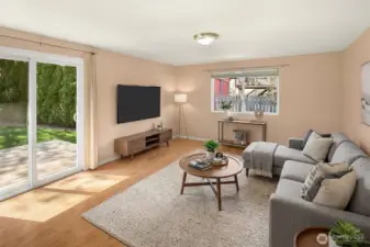 Family room with slider out to the newer trex deck. Virtually staged