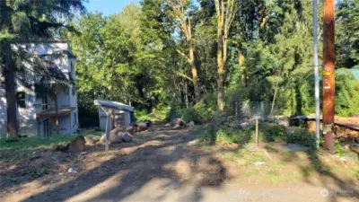 20 foot driveway easement into the lot. Neighbor shed is out of the easement.