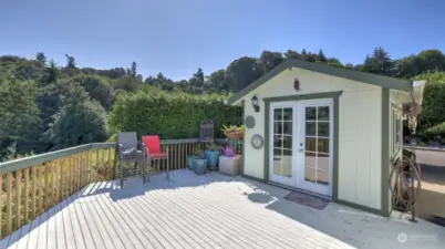 Darling shed on back deck currently used as a studio.