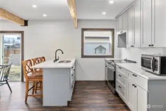 Beautiful counters and cabinets in the kitchen.