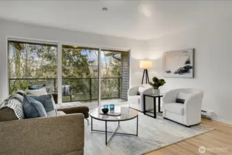 Living Room with Grand Window Wall & Sliding Glass Door to View Deck