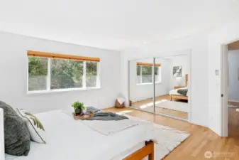 Ample closet space in primary bedroom.