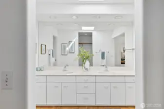 Primary bath double sink vanity with new faucets.