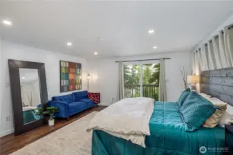 King size primary bedroom with walk-in closet.