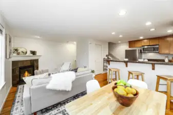 Looking from dining to living and kitchen