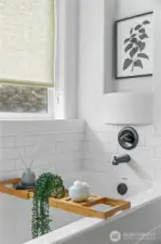 Upgrade large soaking tub in primary bathroom.