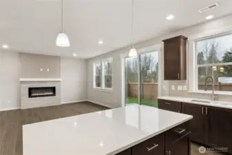 Kitchen opens to great room - home for sale is on a corner homesite and is very private.