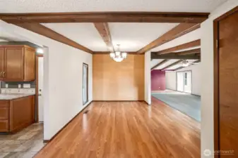 The entry flows into the lovely dining area.