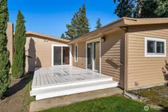Here is the front deck off the living room and 4th bedroom. This overlooks the beautiful fully fenced front yard.