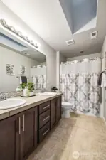 Spacious bath with dual sinks and plenty of storage for busy mornings.