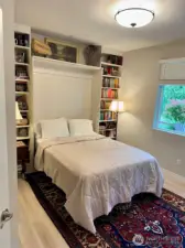 Custom high end Murphy bed stays with home.