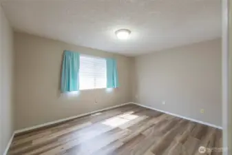 This bedroom makes a great flex space or hobby room.