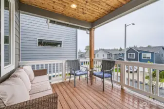 Covered deck to enjoy the outdoors all year long.