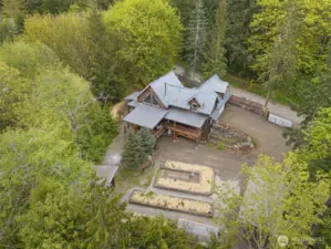 Spacious 1.12 acres bordered by Lucas and Coulter Creeks, this is a truly lovely and unique property.