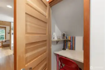 Upstairs closet has been coverted to an adorable office for one of their children.