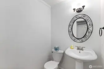 Powder room just off the kitchen.