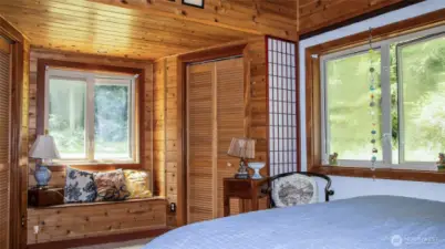 Guest Room looking south across window box cubby - twin deep closets on each side