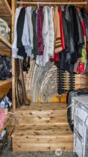 Radiant floor distribution system housed in hallway closet