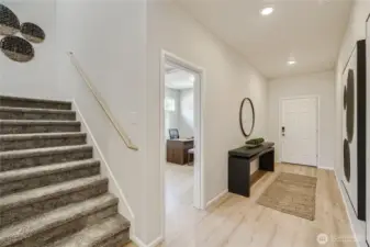Entry and office/Den   Photos are representation as the home is under construction.