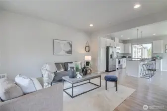 Open living room lots of light.