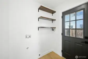 Utility room, ready for buyer to install a top-bottom W/D.