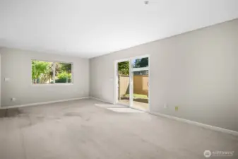 Living Room with Access to Enclosed and Private Patio