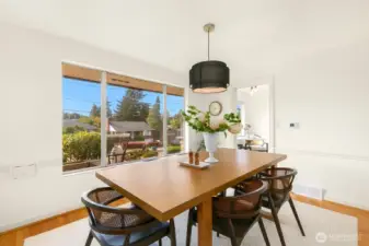 The dining area is very comfortable - and could be expanded by removing the wall towards the kitchen.