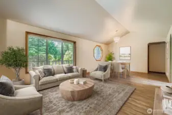 OPEN AND INVITING LIVING ROOM WITH PLENTY OF ROOM FOR FURNITURE, FRIENDS, AND FUN.