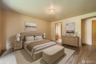 RESTFUL PRIMARY BEDROOM EASILY FITS A KING SIZE BED & PRIVATE ENSUITE BATHROOM.