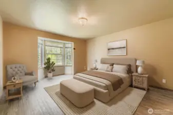 LARGE PRIMARY BEDROOM, W/ BRIGHT BAY WINDOW & PRIVATE ENSUITE BATHROOM.