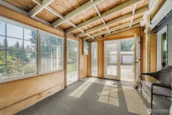 USEFUL ENCLOSED BACK PATIO DECK/MUDROOM.