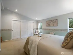 Large, wide triple door closet holds all your garments and more.