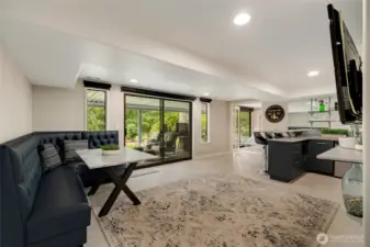 Lower-level entertainment space. Bench seat stays.