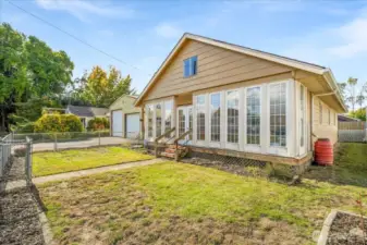 Beautiful windows to the enclosed front porch.
