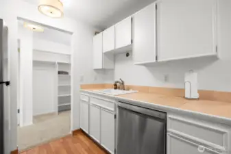 Bright, functional galley kitchen with generous storage space.