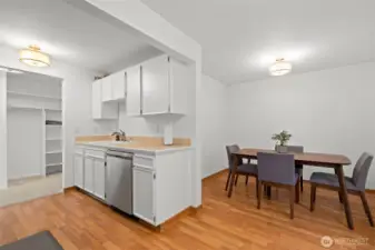 Gather, dine, and linger—your dining space flows seamlessly between kitchen and eating space.