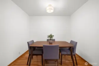 Intimate dining space made for hosting cozy dinners and long conversations.