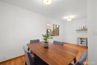 Gather around the table—this warm dining area is perfect for everyday meals and special moments.