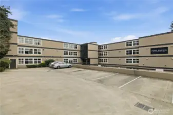 front view of building with the guest parking