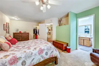 The primary bedroom with a walk-in closet and easily accessed full bathroom.