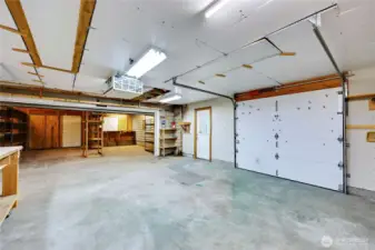 Another view of the inside of the single-car garage with more workshop space beyond. So many possibilities!
