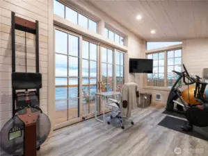 The boat house is currently being used as a home gym studio. The possibilities in this space are endless.